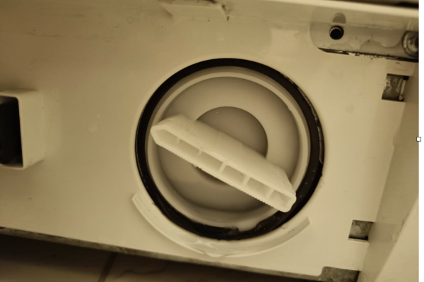 So reinigen Sie einen verstopften Waschmaschinenfilter > Schritte